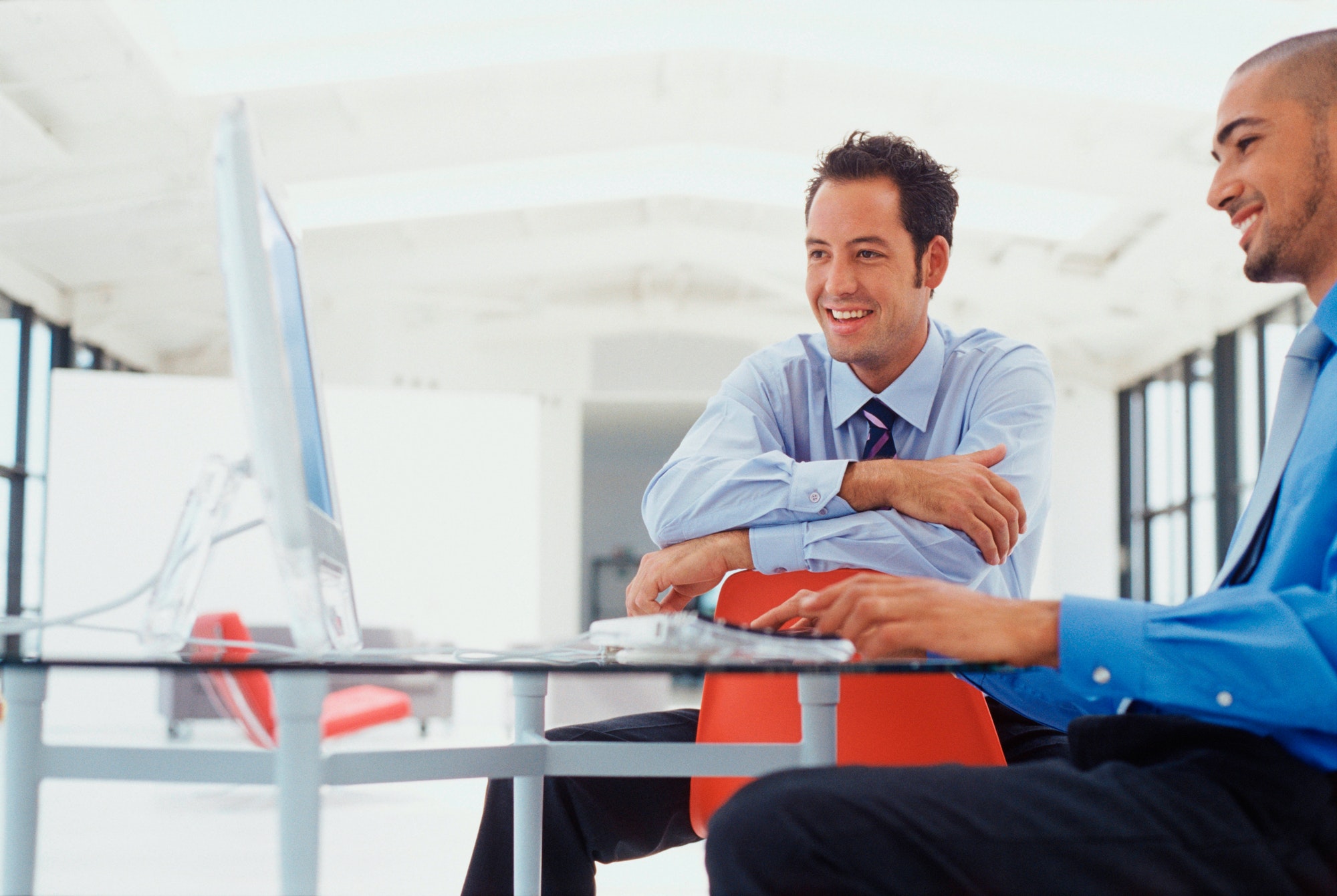 Businessmen working on computer