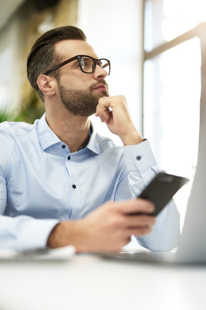 man-getting-thoughts-together-before-making-phone-call.jpg