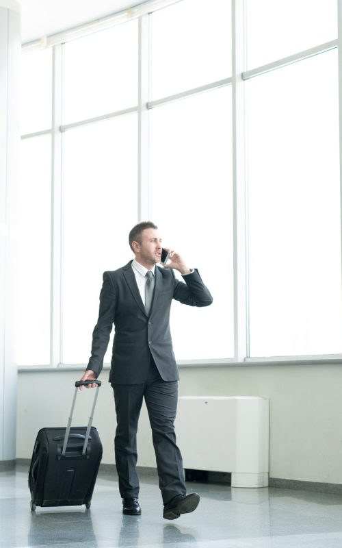 businessman-walking-in-airport.jpg
